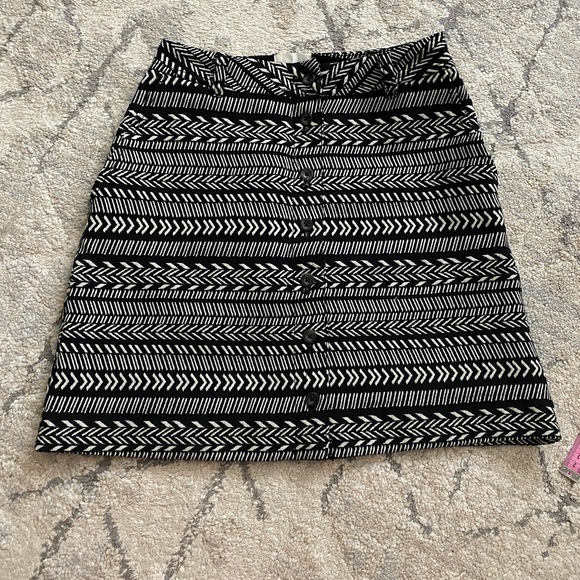 Anthropologie Dresses & Skirts - Anthropologie front Button down skirt 🖤✨